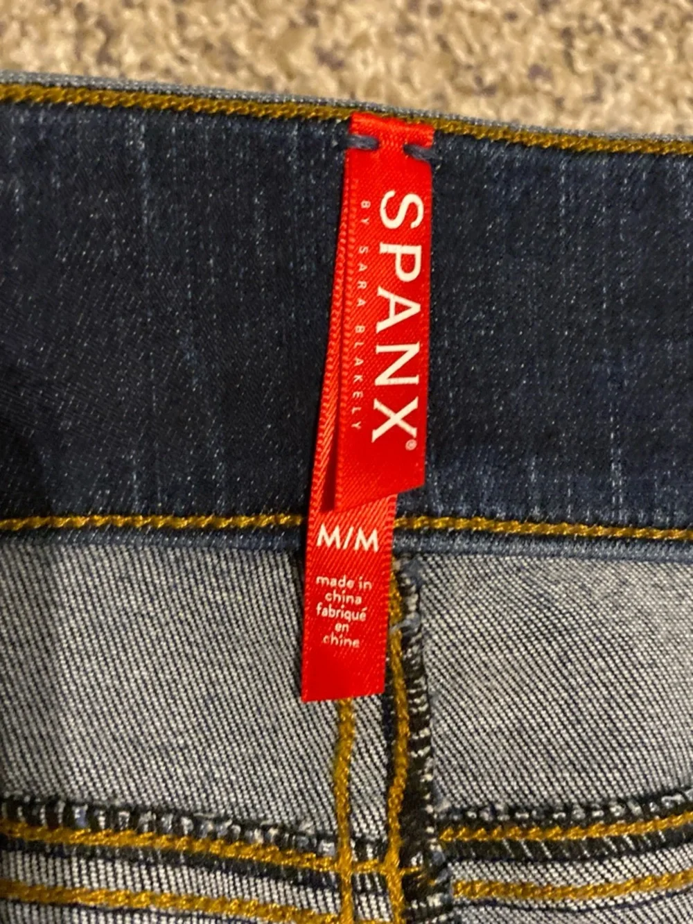 SPANX Dark Blue Jeggings with Subtle Distress - Picture 2 of 5